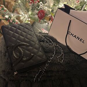 CHANEL Black Calfskin Cambon
Zip Around Organizer Wallet On Chain